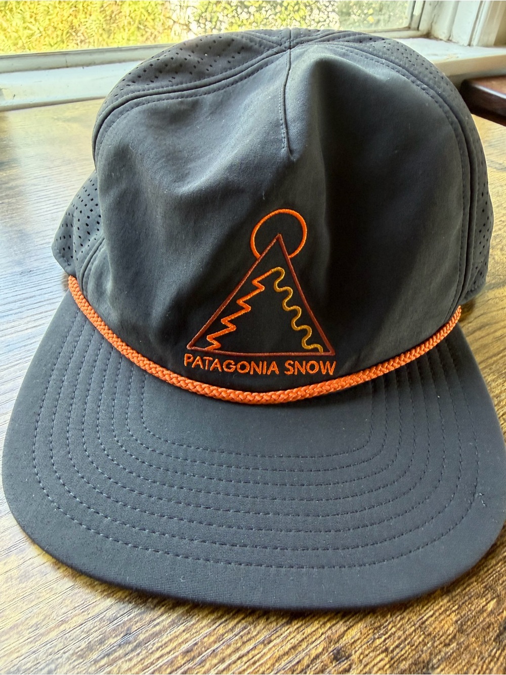 Patagonia Snow Black Cap with Orange Trim